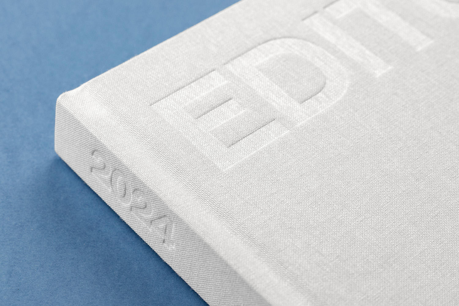 Mango catalog binding embossing